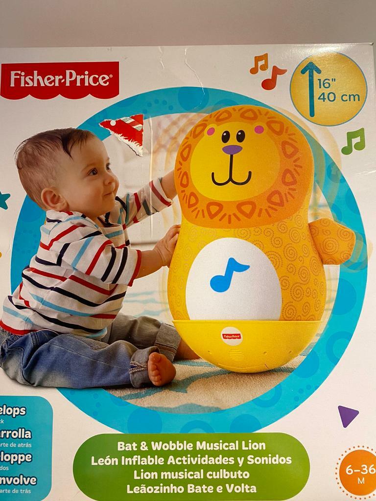 fisher price bat & wobble musical lion